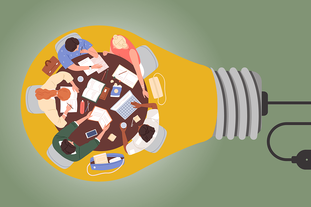 graphic of team sitting together in a table on top of a lightbulb to signify collaborative decision-making