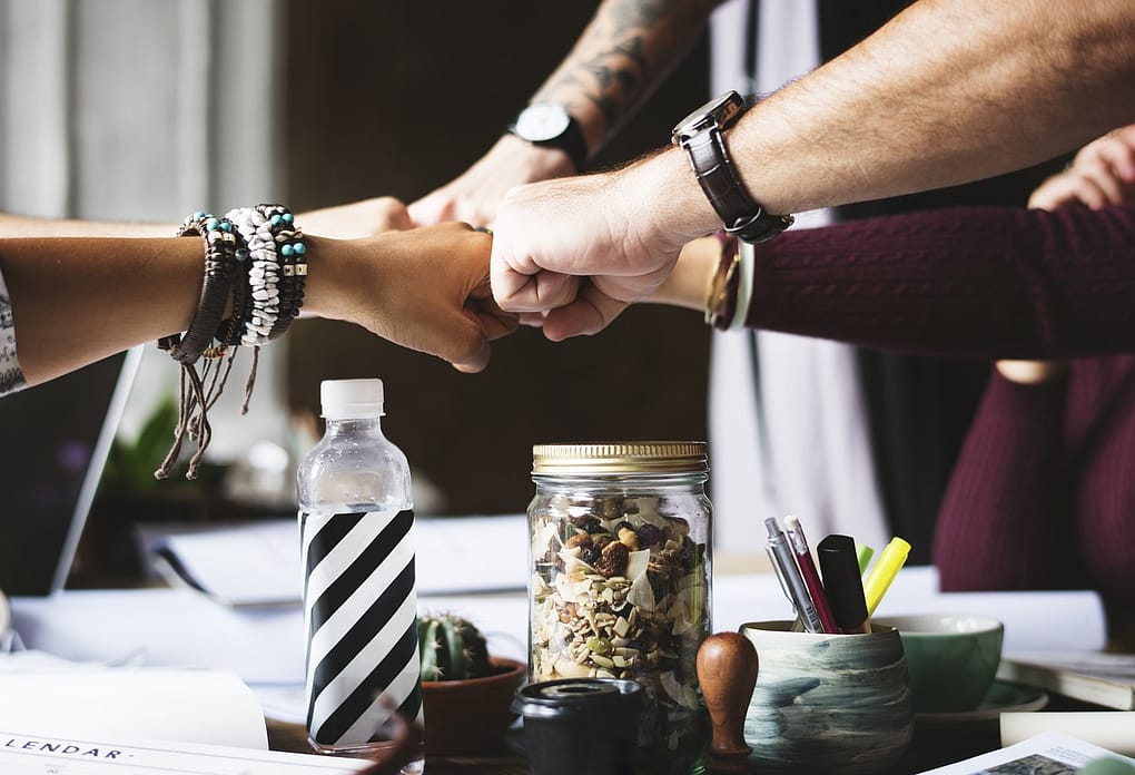 hands brought together in unity to signify a strategic alliance