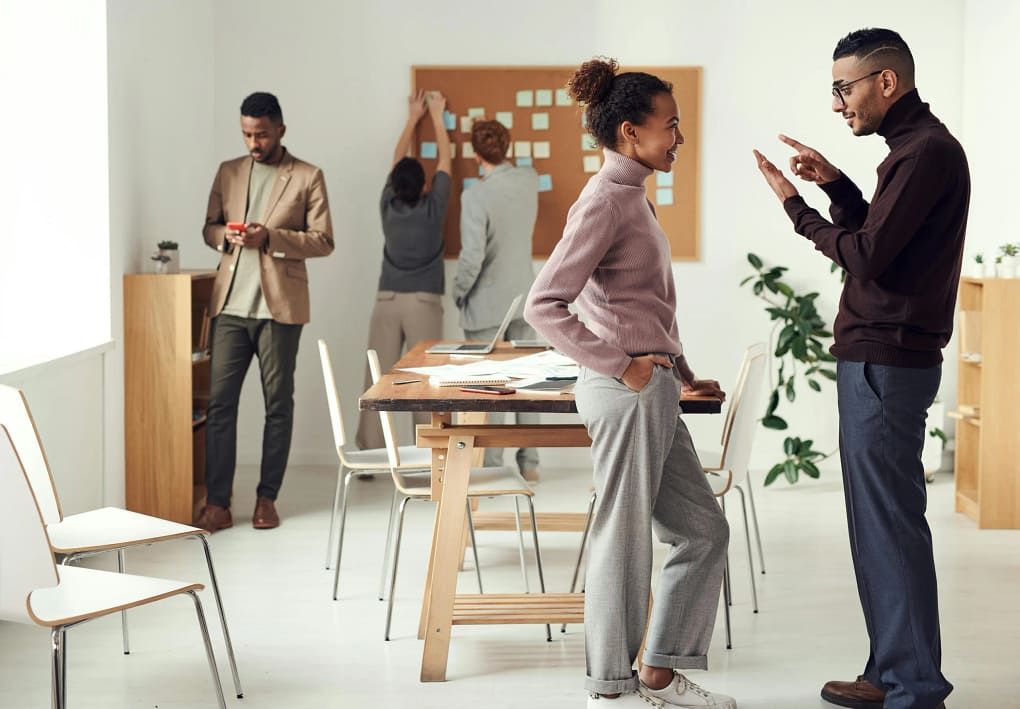 a room full of engaged employees due to effective conflict management
