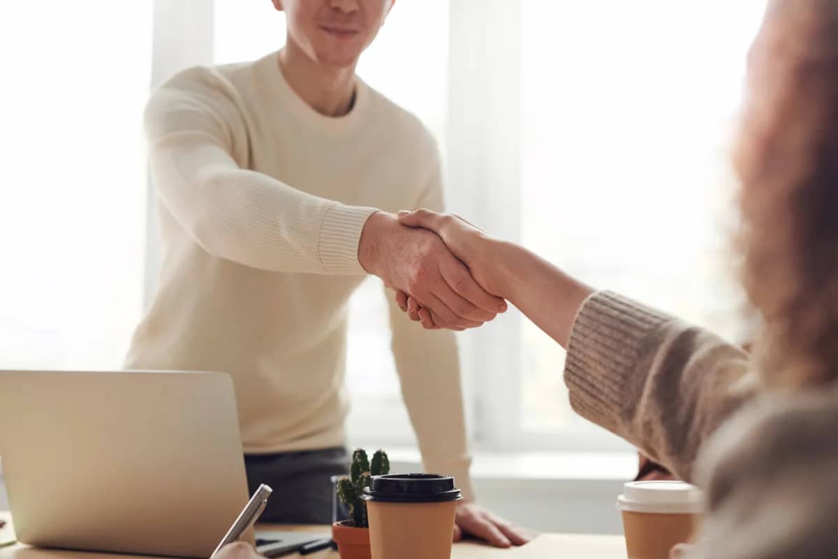 successful hiring indicated by a handshake