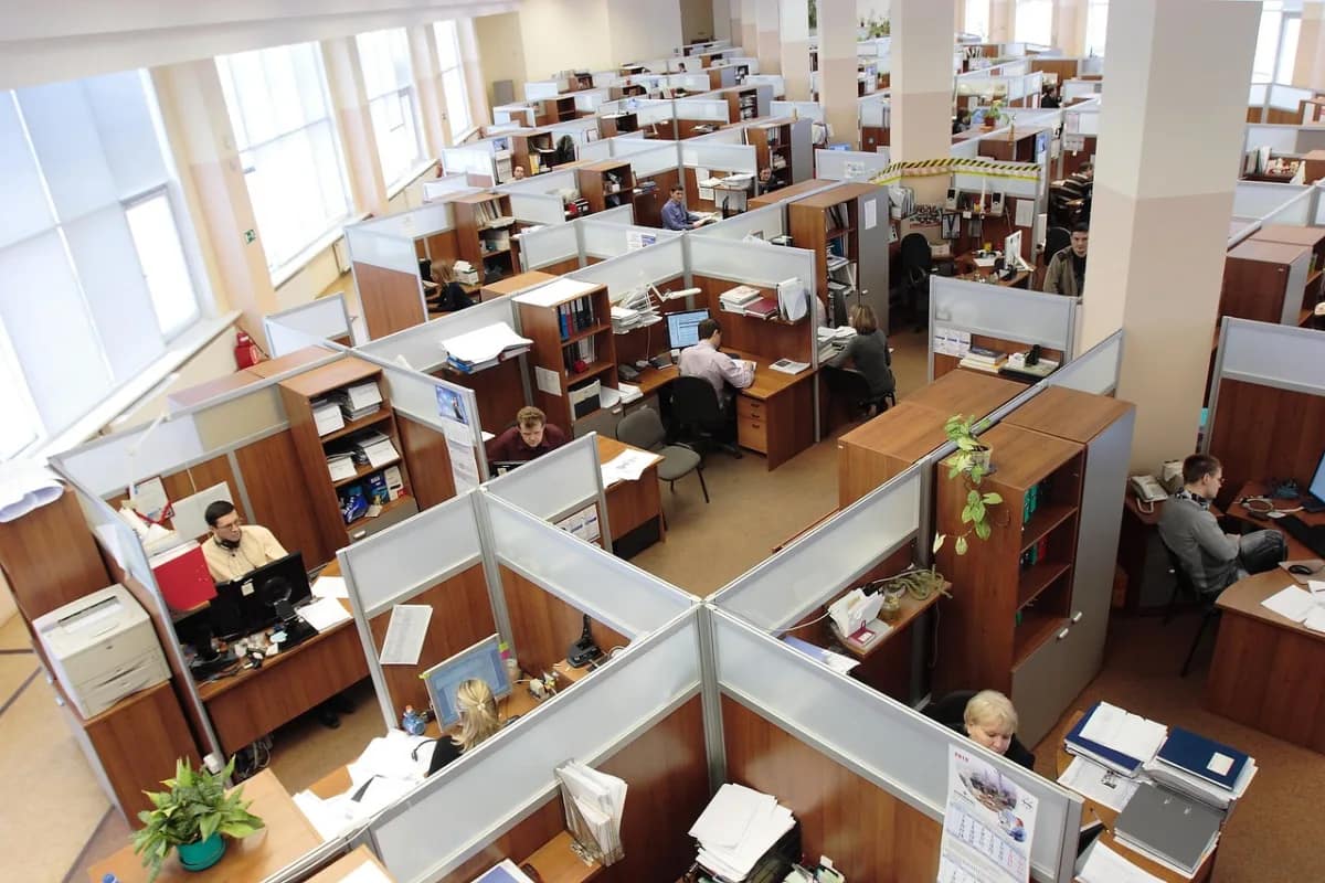 layout of employee cubicles, symbolizing a productive workplace with upskilling and reskilling