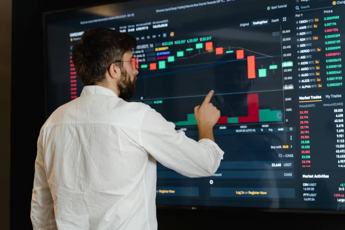 business executive reviewing the negative business growth numbers, necessitating corporate downsizing